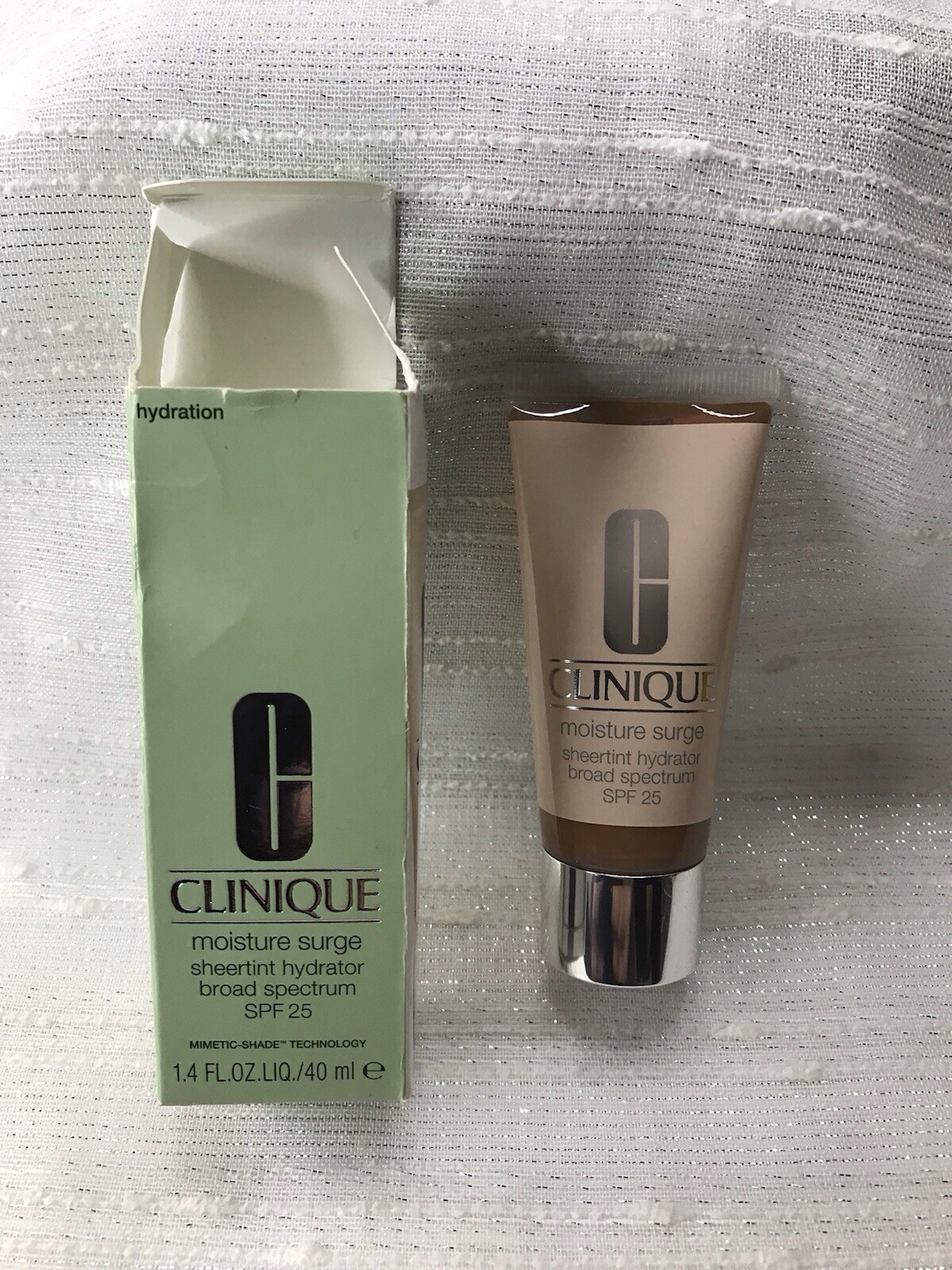 CLINIQUE Moisture Surge Sheertint Hydrator SPF 25 Universal Medium Deep 1.4oz