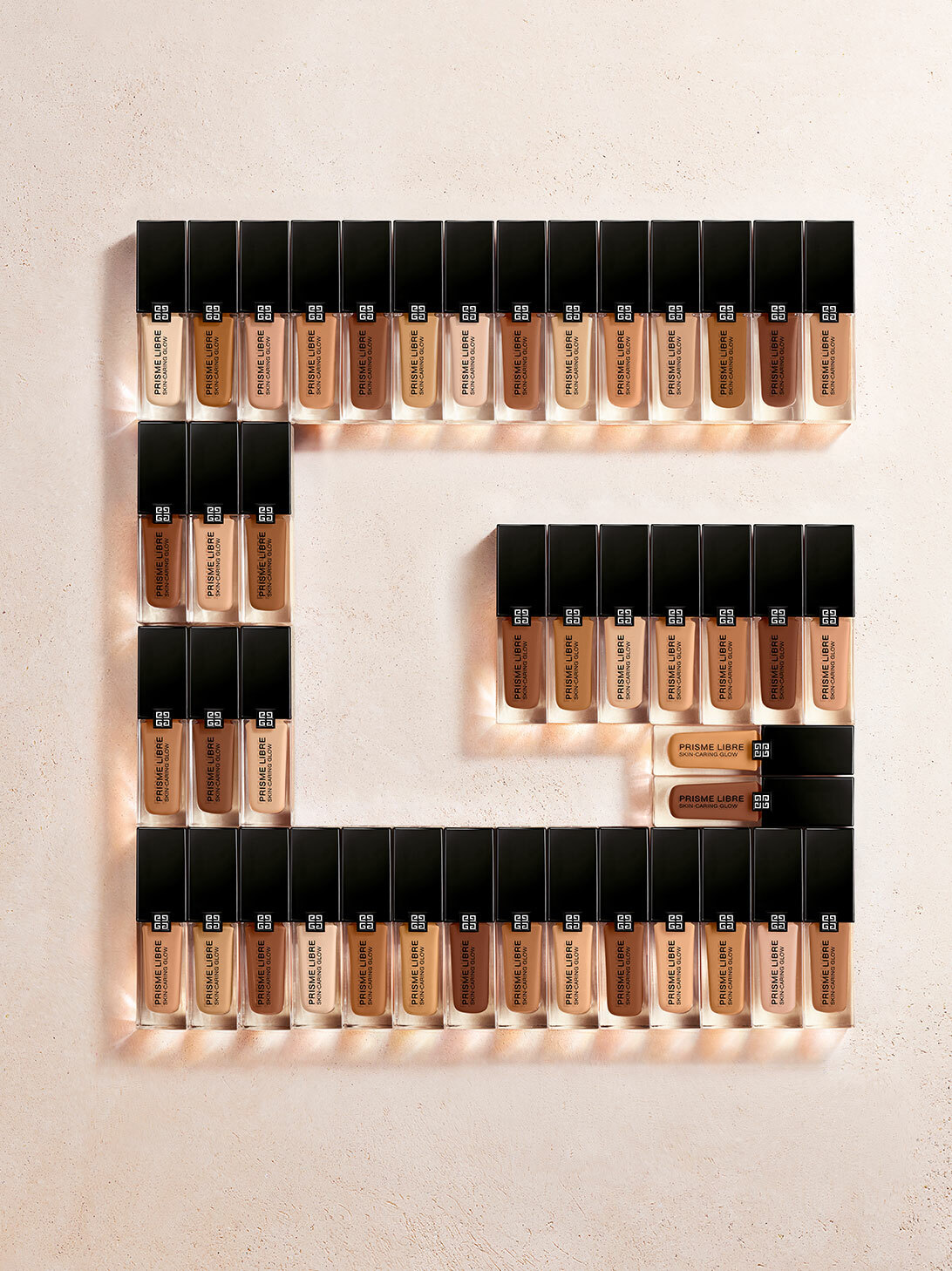 Givenchy Prisme Libre Skin Caring Glow Foundation in shade W105 Brand New