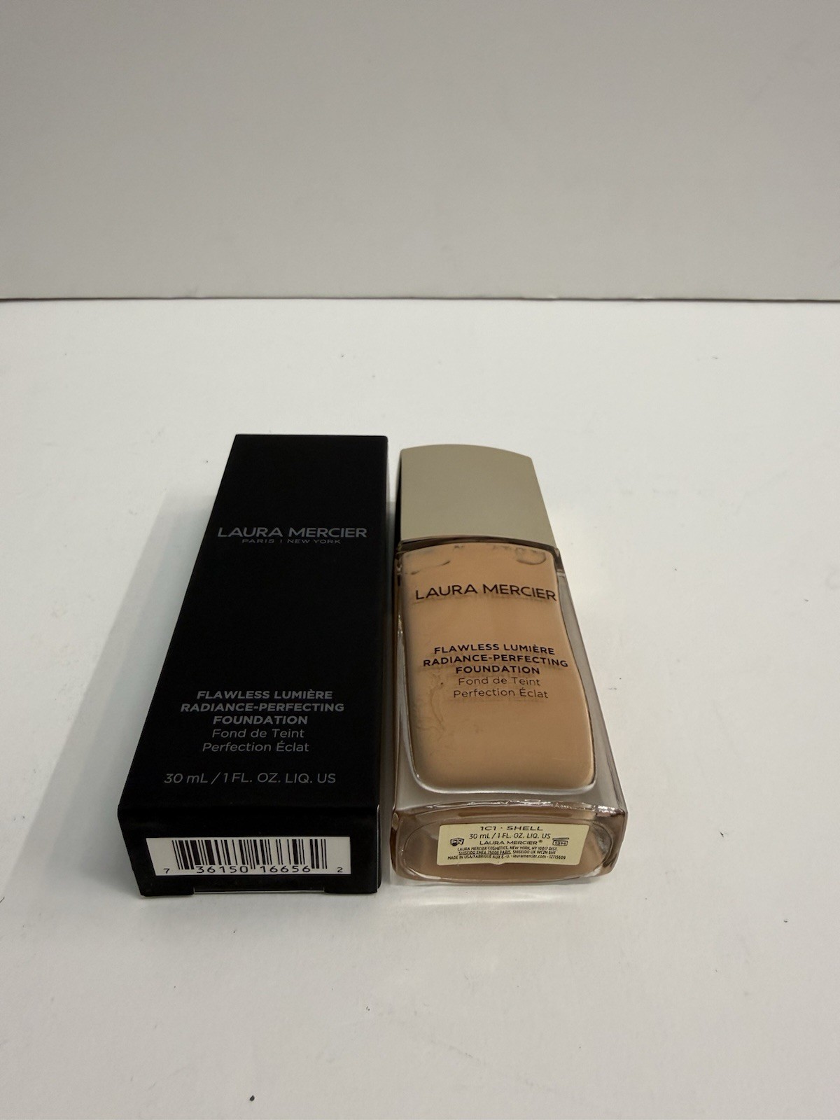 Laura Mercier Flawless Lumiere Radiance-Perfecting Foundation – 1C1 Shell, 1 oz