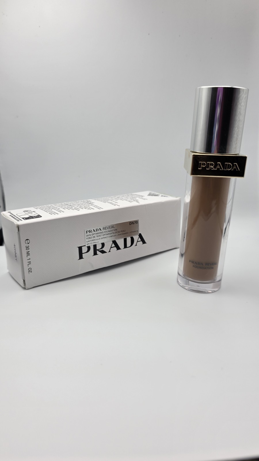 Prada Reveal Foundation DN70 Neutral Undertone Dark Tone SPF 17 30ml Vitamin E