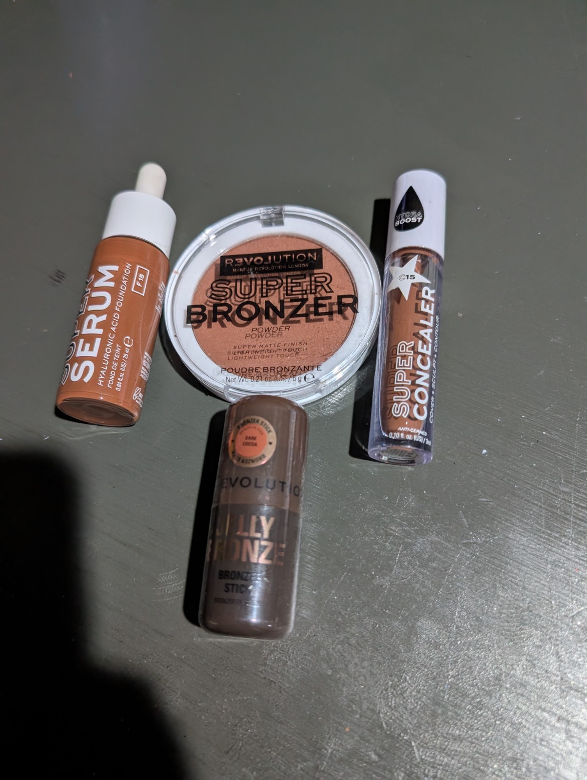 Revolution Makeup Set Foundation In F15, Concealer In C15, Bronzer, Jelly Bronze