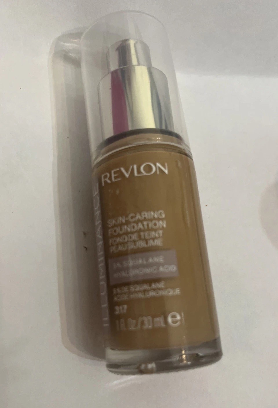 317 Tan Sand. Revlon Illuminance Skin Caring Foundation Hyaluronic Acid.