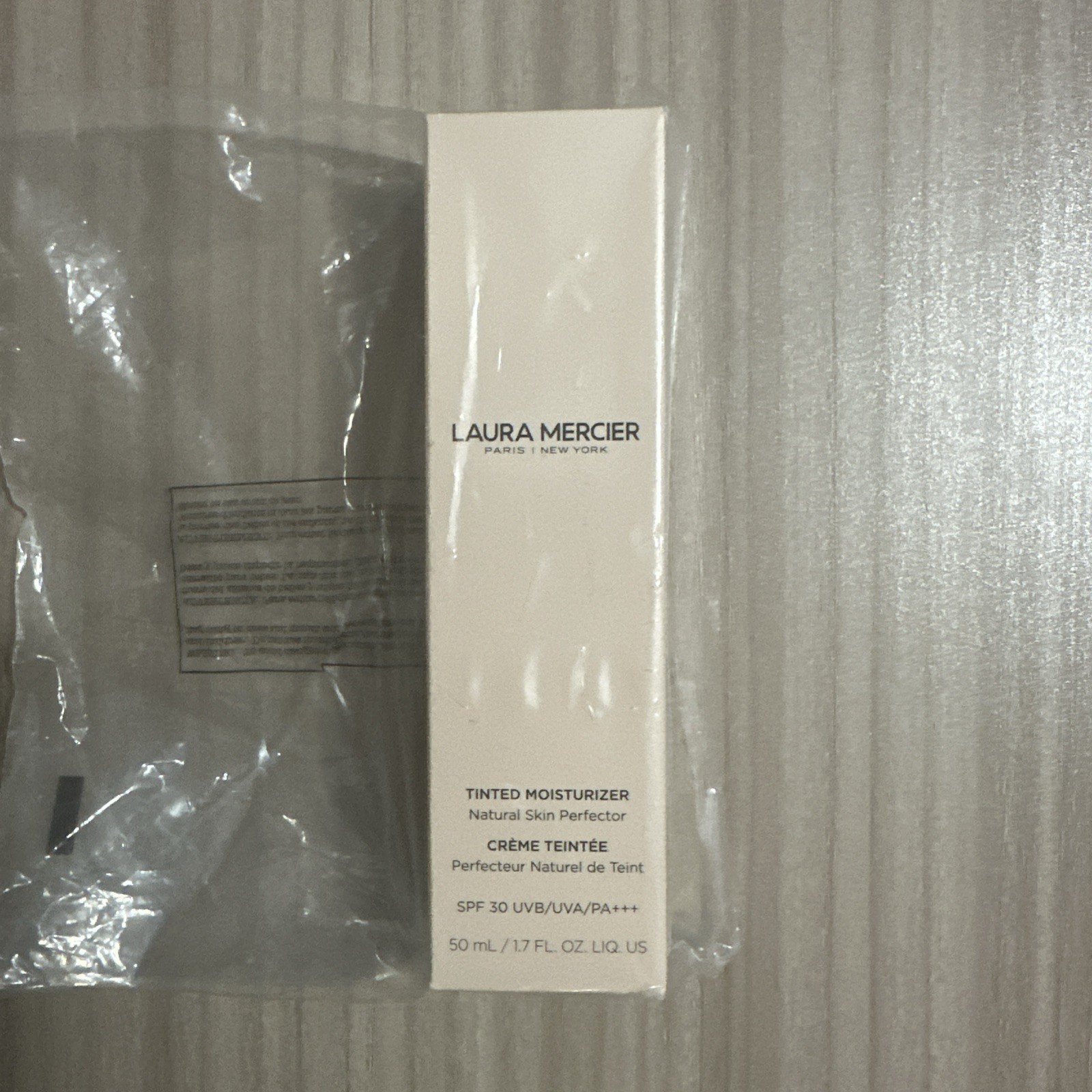 Laura Mercier tinted Moisturizer 1.7 Fluid Ounces Shade Tawny