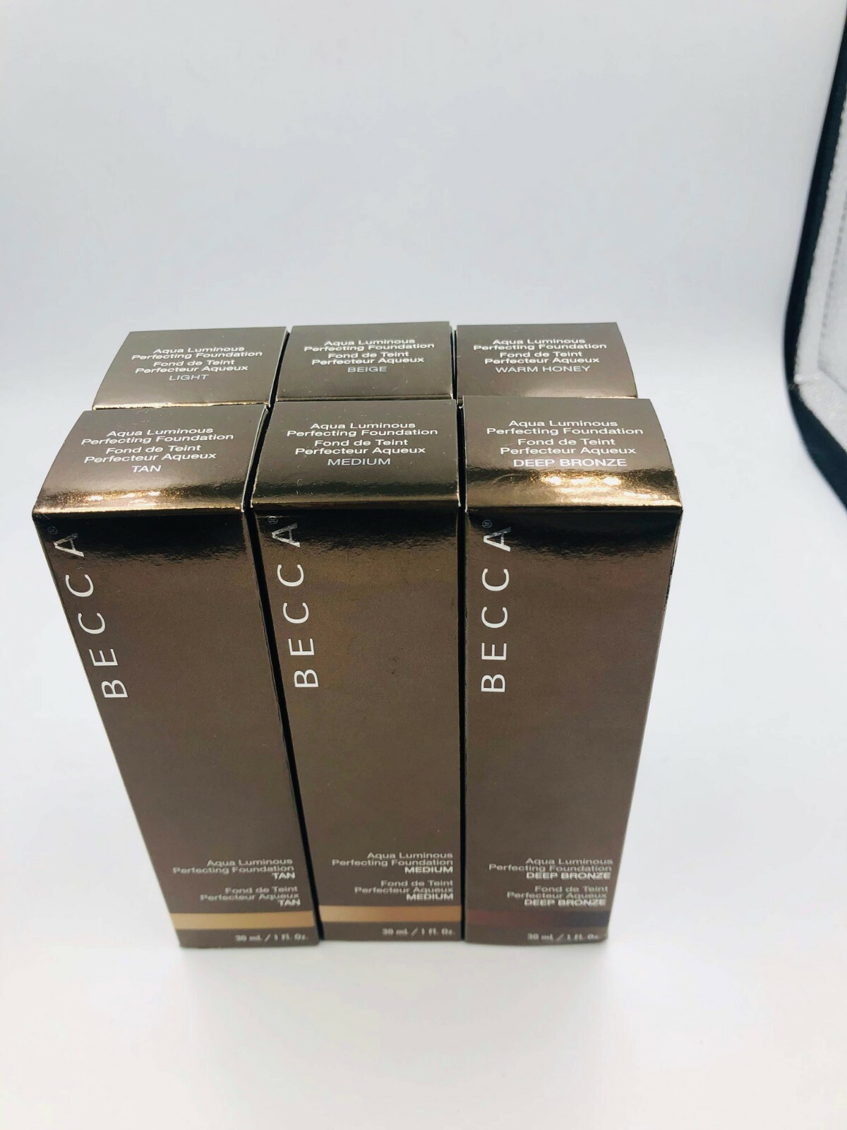BECCA AQUA LUMINOUS PERFECTING FOUNDATION – CHOOSE YOUR SHADE- 1 OZ – BOXED