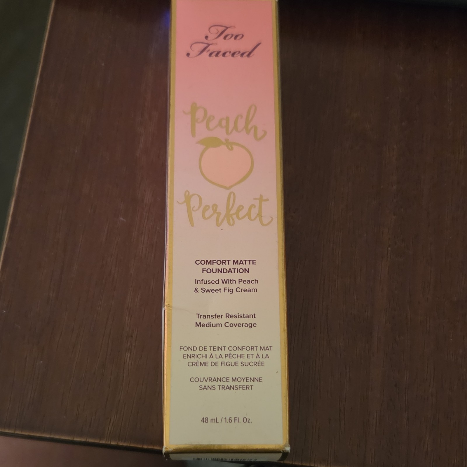 Too Faced Peach Perfect Comfort Matte Foundation in the shade Natural Beige.