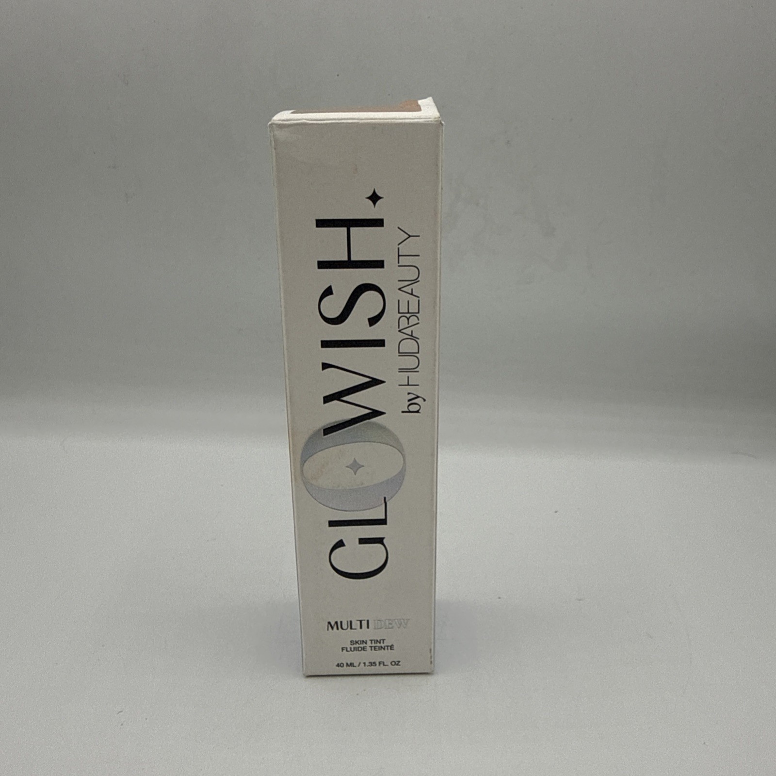 HudaBeauty Glowish Multidew 04 Light Medium Skin Tint Foundation 1.35 oz