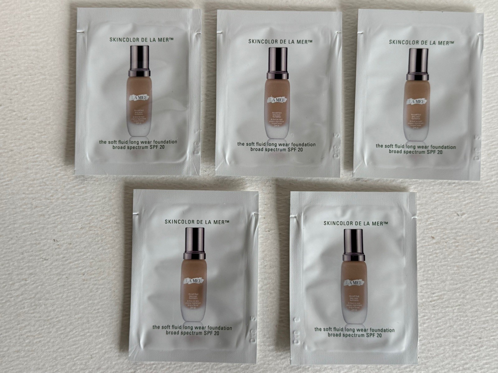 5x LA MER THE SOFT FLUID FOUNDATION SAMPLE PACKETS NATURAL 12, 0.03 oz/1 ml Each