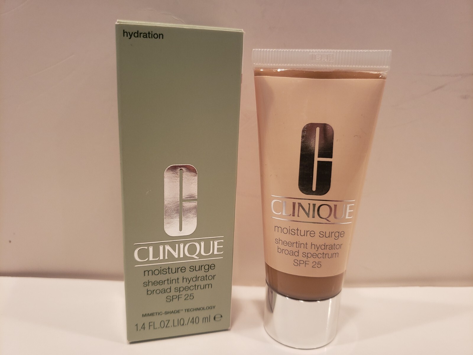 Clinique Moisture Surge Sheertint Hydrator BS SPF 25 Universal Medium Deep 1.4Oz