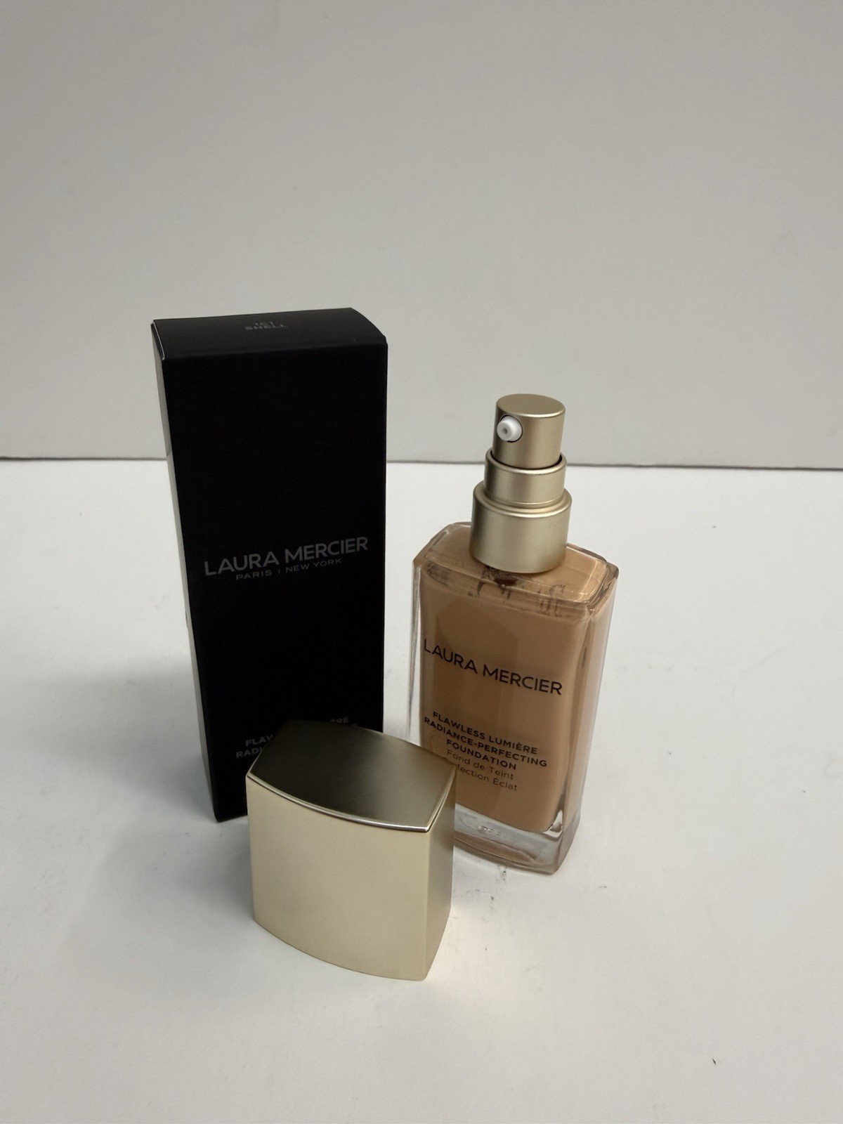 Laura Mercier Flawless Lumiere Radiance-Perfecting Foundation – 1C1 Shell, 1 oz