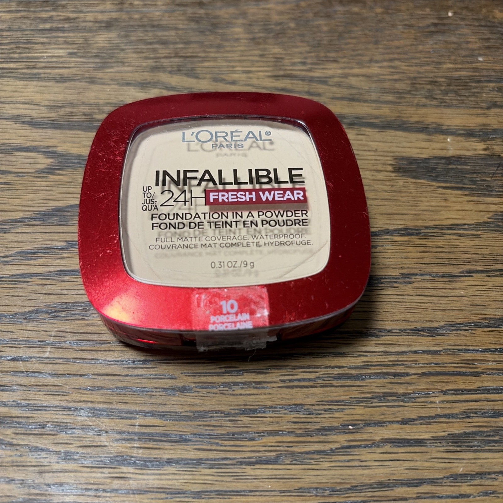 L’Oreal Infallible 24H Fresh Wear Foundation in a Powder 10 Porcelain Unsealed .