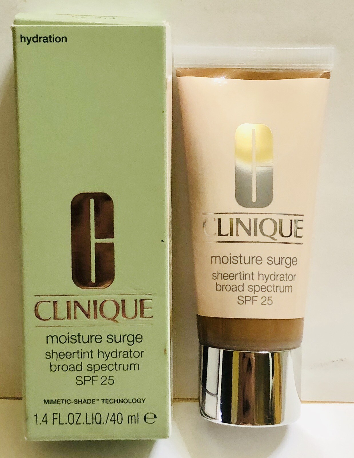 NIB – CLINIQUE MOISTURE SURGE SHEERTINT HYDRATOR UNIVERSAL MEDIUM DEEP – 1.4 OZ