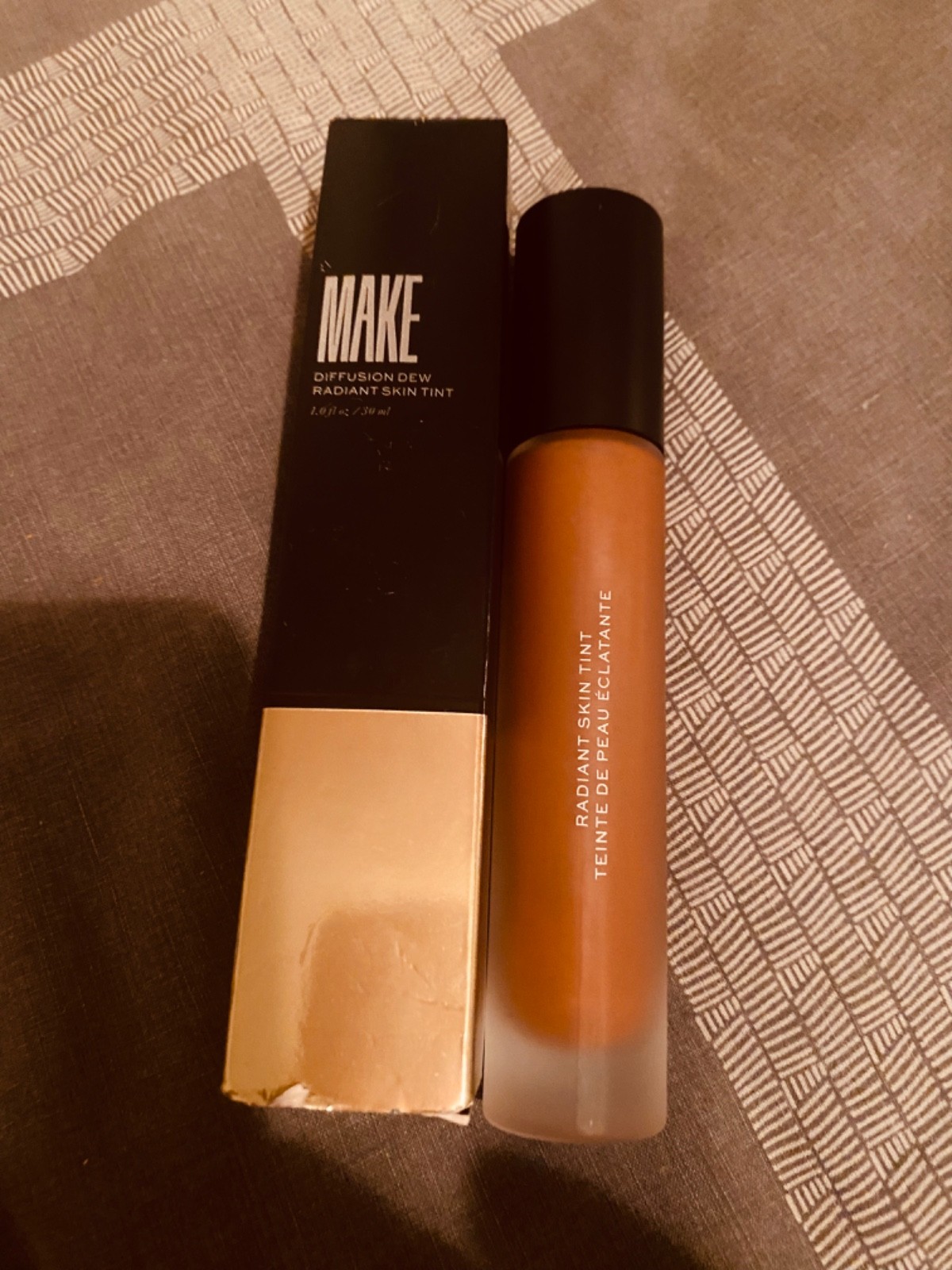 Beauty Diffusion Dew Skin Tint. Sheer to Medium Coverag Radiant Finish. Hazelnut
